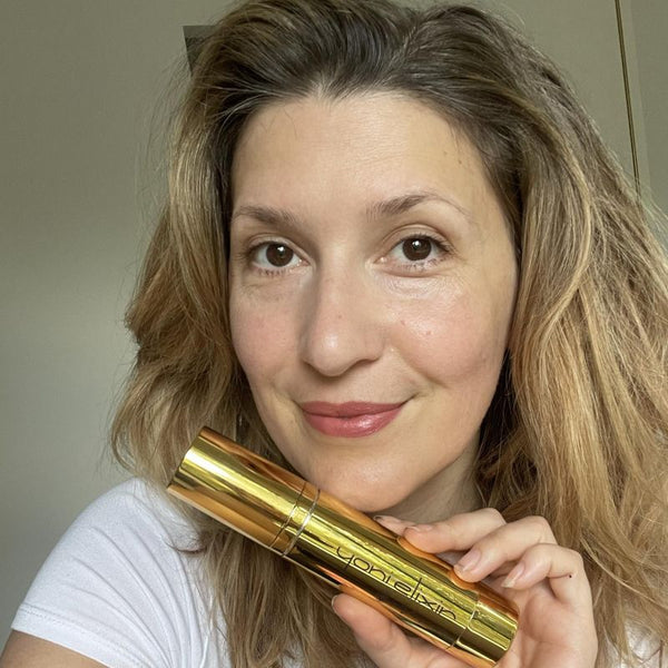 A Yoni Elixir customer with her bottle